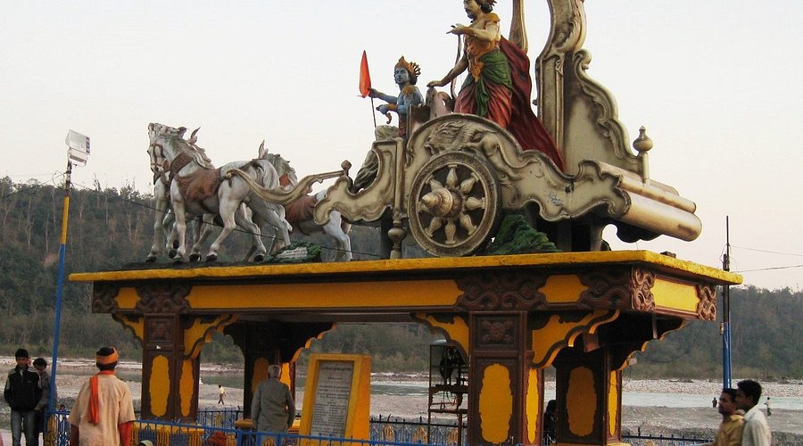 Evening ritual by the Ganges with live music and participatory puja, set against a serene backdrop. Cultural events and spiritual ambiance are highlights, with sunset adding to the experience.